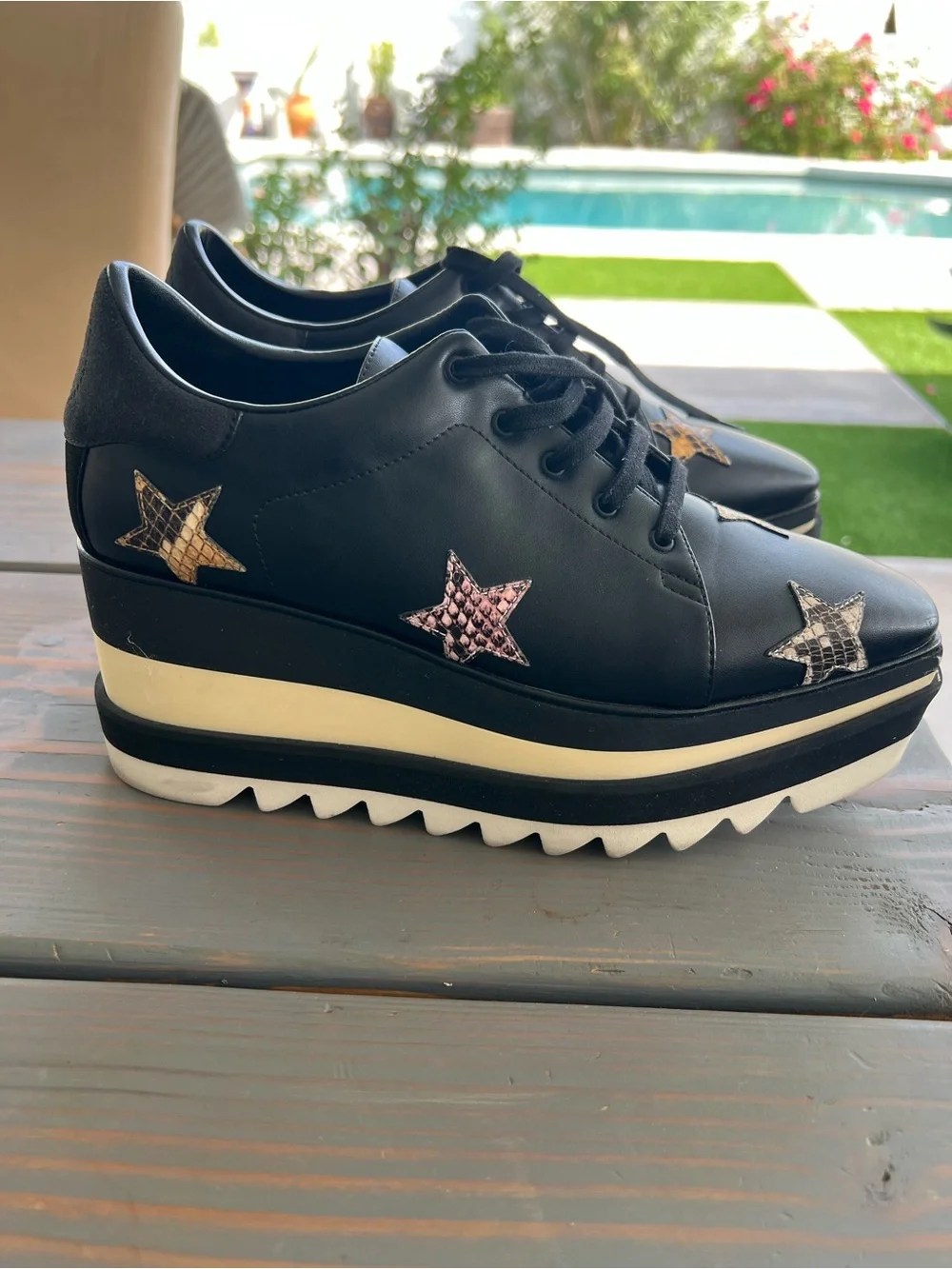 Stella McCartney Black Platform Lace-Up Sneakers with Star Appliqués